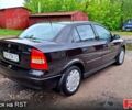 Черный Опель Астра, объемом двигателя 1.4 л и пробегом 91 тыс. км за 5100 $, фото 4 на Automoto.ua