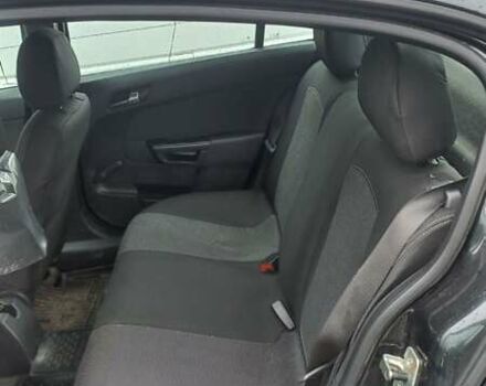 Черный Опель Астра, объемом двигателя 1.6 л и пробегом 310 тыс. км за 5000 $, фото 1 на Automoto.ua