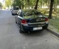 Черный Опель Астра, объемом двигателя 1.6 л и пробегом 165 тыс. км за 5500 $, фото 1 на Automoto.ua