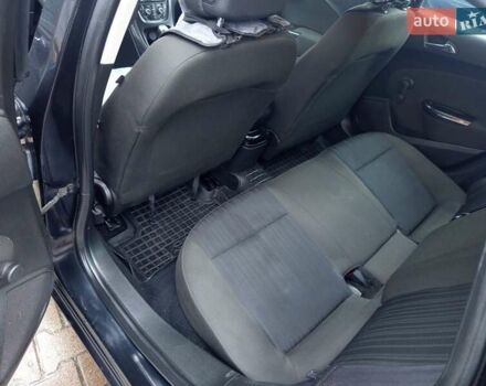 Черный Опель Астра, объемом двигателя 1.6 л и пробегом 253 тыс. км за 7999 $, фото 7 на Automoto.ua