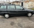 Черный Опель Астра, объемом двигателя 1.8 л и пробегом 100 тыс. км за 1250 $, фото 2 на Automoto.ua