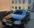 Черный Опель Астра, объемом двигателя 2 л и пробегом 250 тыс. км за 1550 $, фото 1 на Automoto.ua