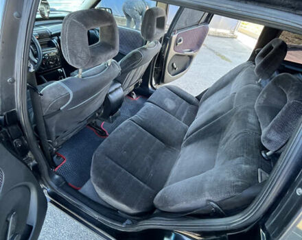 Черный Опель Астра, объемом двигателя 1.7 л и пробегом 590 тыс. км за 2400 $, фото 12 на Automoto.ua