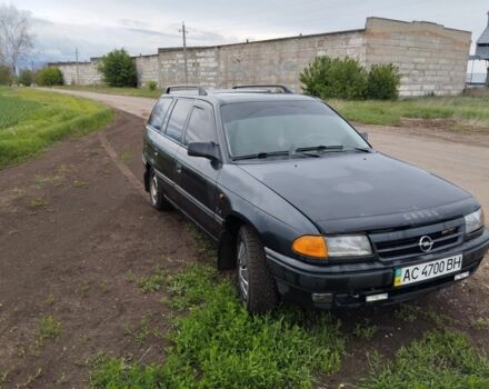 Черный Опель Астра, объемом двигателя 1.6 л и пробегом 300 тыс. км за 100000 $, фото 5 на Automoto.ua