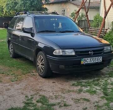 Черный Опель Астра, объемом двигателя 1.6 л и пробегом 270 тыс. км за 1750 $, фото 1 на Automoto.ua