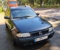 Чорний Опель Астра, об'ємом двигуна 2 л та пробігом 300 тис. км за 1234 $, фото 1 на Automoto.ua