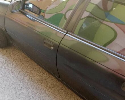 Черный Опель Астра, объемом двигателя 1.6 л и пробегом 500 тыс. км за 1850 $, фото 3 на Automoto.ua