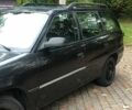 Черный Опель Астра, объемом двигателя 1.8 л и пробегом 340 тыс. км за 1100 $, фото 2 на Automoto.ua
