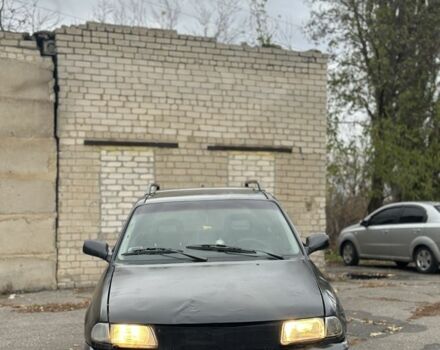 Черный Опель Астра, объемом двигателя 1.6 л и пробегом 341 тыс. км за 1000 $, фото 1 на Automoto.ua