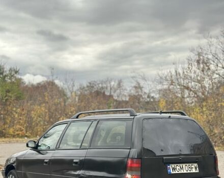 Черный Опель Астра, объемом двигателя 1.6 л и пробегом 341 тыс. км за 1000 $, фото 3 на Automoto.ua