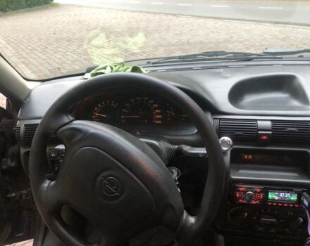 Черный Опель Астра, объемом двигателя 1.8 л и пробегом 1 тыс. км за 899 $, фото 9 на Automoto.ua