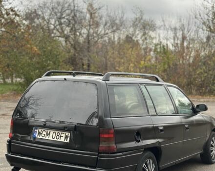 Черный Опель Астра, объемом двигателя 1.6 л и пробегом 341 тыс. км за 1000 $, фото 5 на Automoto.ua