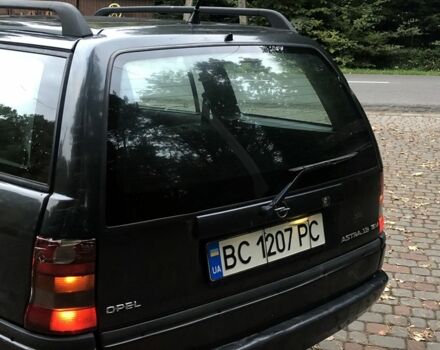 Черный Опель Астра, объемом двигателя 1.8 л и пробегом 1 тыс. км за 899 $, фото 4 на Automoto.ua