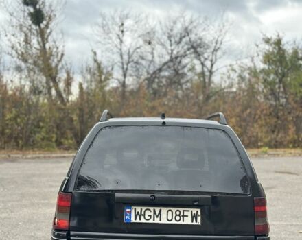 Черный Опель Астра, объемом двигателя 1.6 л и пробегом 341 тыс. км за 1000 $, фото 4 на Automoto.ua