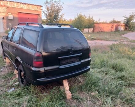 Черный Опель Астра, объемом двигателя 2 л и пробегом 200 тыс. км за 237 $, фото 7 на Automoto.ua