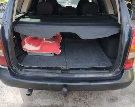 Черный Опель Астра, объемом двигателя 1.7 л и пробегом 400 тыс. км за 2800 $, фото 7 на Automoto.ua