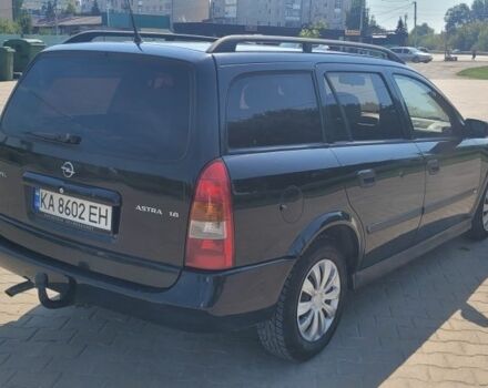 Черный Опель Астра, объемом двигателя 1.6 л и пробегом 292 тыс. км за 3500 $, фото 5 на Automoto.ua
