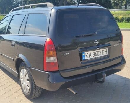Черный Опель Астра, объемом двигателя 1.6 л и пробегом 292 тыс. км за 3500 $, фото 4 на Automoto.ua
