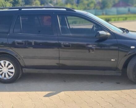 Черный Опель Астра, объемом двигателя 1.6 л и пробегом 292 тыс. км за 3500 $, фото 10 на Automoto.ua