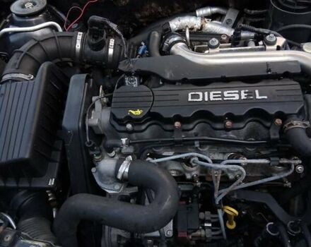 Черный Опель Астра, объемом двигателя 1.7 л и пробегом 400 тыс. км за 2800 $, фото 1 на Automoto.ua