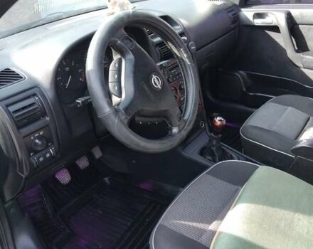 Черный Опель Астра, объемом двигателя 1.7 л и пробегом 400 тыс. км за 2800 $, фото 3 на Automoto.ua