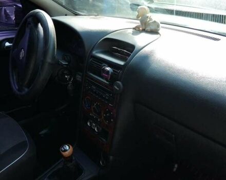 Черный Опель Астра, объемом двигателя 1.7 л и пробегом 400 тыс. км за 2800 $, фото 4 на Automoto.ua