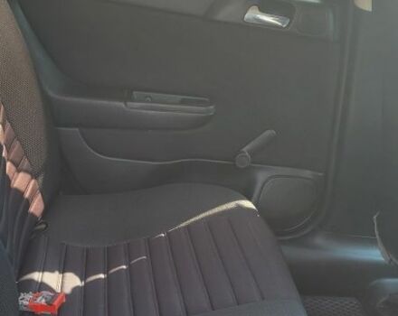 Черный Опель Астра, объемом двигателя 1.6 л и пробегом 292 тыс. км за 3500 $, фото 6 на Automoto.ua