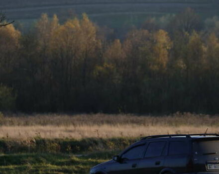 Черный Опель Астра, объемом двигателя 1.6 л и пробегом 348 тыс. км за 3800 $, фото 1 на Automoto.ua