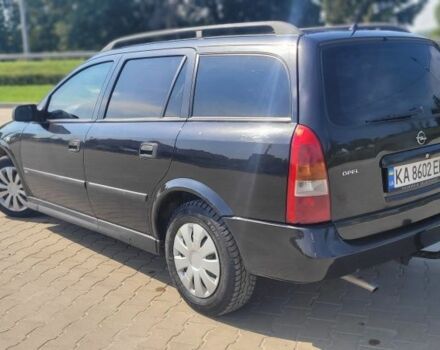 Черный Опель Астра, объемом двигателя 1.6 л и пробегом 292 тыс. км за 3500 $, фото 19 на Automoto.ua