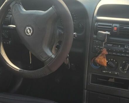 Черный Опель Астра, объемом двигателя 1.6 л и пробегом 292 тыс. км за 3500 $, фото 8 на Automoto.ua