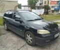 Черный Опель Астра, объемом двигателя 1.6 л и пробегом 351 тыс. км за 1601 $, фото 1 на Automoto.ua