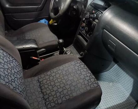 Чорний Опель Астра, об'ємом двигуна 2 л та пробігом 321 тис. км за 3100 $, фото 23 на Automoto.ua