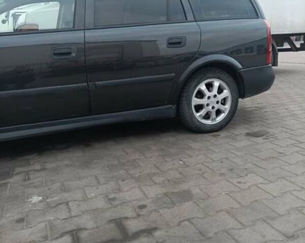 Чорний Опель Астра, об'ємом двигуна 2 л та пробігом 321 тис. км за 3100 $, фото 5 на Automoto.ua