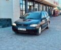 Черный Опель Астра, объемом двигателя 2 л и пробегом 400 тыс. км за 1250 $, фото 1 на Automoto.ua