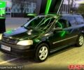 Черный Опель Астра, объемом двигателя 2 л и пробегом 300 тыс. км за 2500 $, фото 1 на Automoto.ua