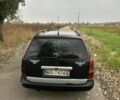 Черный Опель Астра, объемом двигателя 2 л и пробегом 258 тыс. км за 952 $, фото 12 на Automoto.ua
