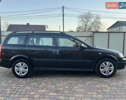 Черный Опель Астра, объемом двигателя 2 л и пробегом 223 тыс. км за 2999 $, фото 9 на Automoto.ua