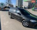 Черный Опель Астра, объемом двигателя 1.7 л и пробегом 176 тыс. км за 1550 $, фото 1 на Automoto.ua