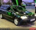 Черный Опель Астра, объемом двигателя 2 л и пробегом 300 тыс. км за 2500 $, фото 2 на Automoto.ua