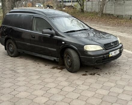Черный Опель Астра, объемом двигателя 1.7 л и пробегом 666 тыс. км за 1375 $, фото 2 на Automoto.ua