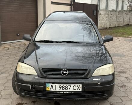 Черный Опель Астра, объемом двигателя 1.7 л и пробегом 666 тыс. км за 1375 $, фото 1 на Automoto.ua