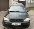 Черный Опель Астра, объемом двигателя 1.7 л и пробегом 666 тыс. км за 1375 $, фото 1 на Automoto.ua