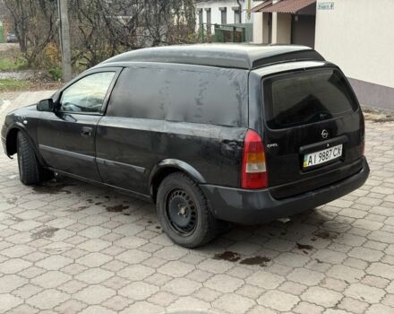 Черный Опель Астра, объемом двигателя 1.7 л и пробегом 666 тыс. км за 1375 $, фото 6 на Automoto.ua