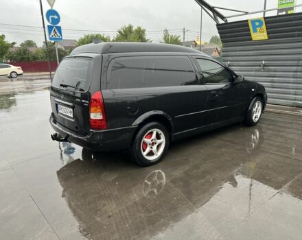 Черный Опель Астра, объемом двигателя 1.7 л и пробегом 175 тыс. км за 1200 $, фото 1 на Automoto.ua