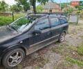 Черный Опель Астра, объемом двигателя 1.6 л и пробегом 269 тыс. км за 2000 $, фото 2 на Automoto.ua