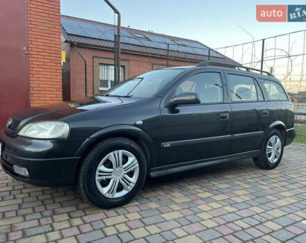 Черный Опель Астра, объемом двигателя 2 л и пробегом 223 тыс. км за 2999 $, фото 4 на Automoto.ua