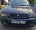 Черный Опель Астра, объемом двигателя 1.8 л и пробегом 235 тыс. км за 3300 $, фото 1 на Automoto.ua