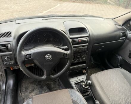 Черный Опель Астра, объемом двигателя 1.7 л и пробегом 666 тыс. км за 1375 $, фото 12 на Automoto.ua