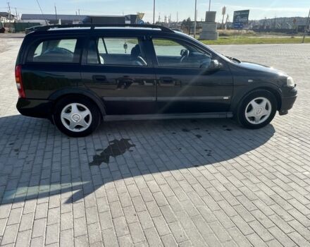 Черный Опель Астра, объемом двигателя 2 л и пробегом 293 тыс. км за 2150 $, фото 4 на Automoto.ua