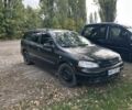 Черный Опель Астра, объемом двигателя 2 л и пробегом 258 тыс. км за 952 $, фото 1 на Automoto.ua